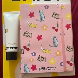 Marc Jacobs lotion and notebook.